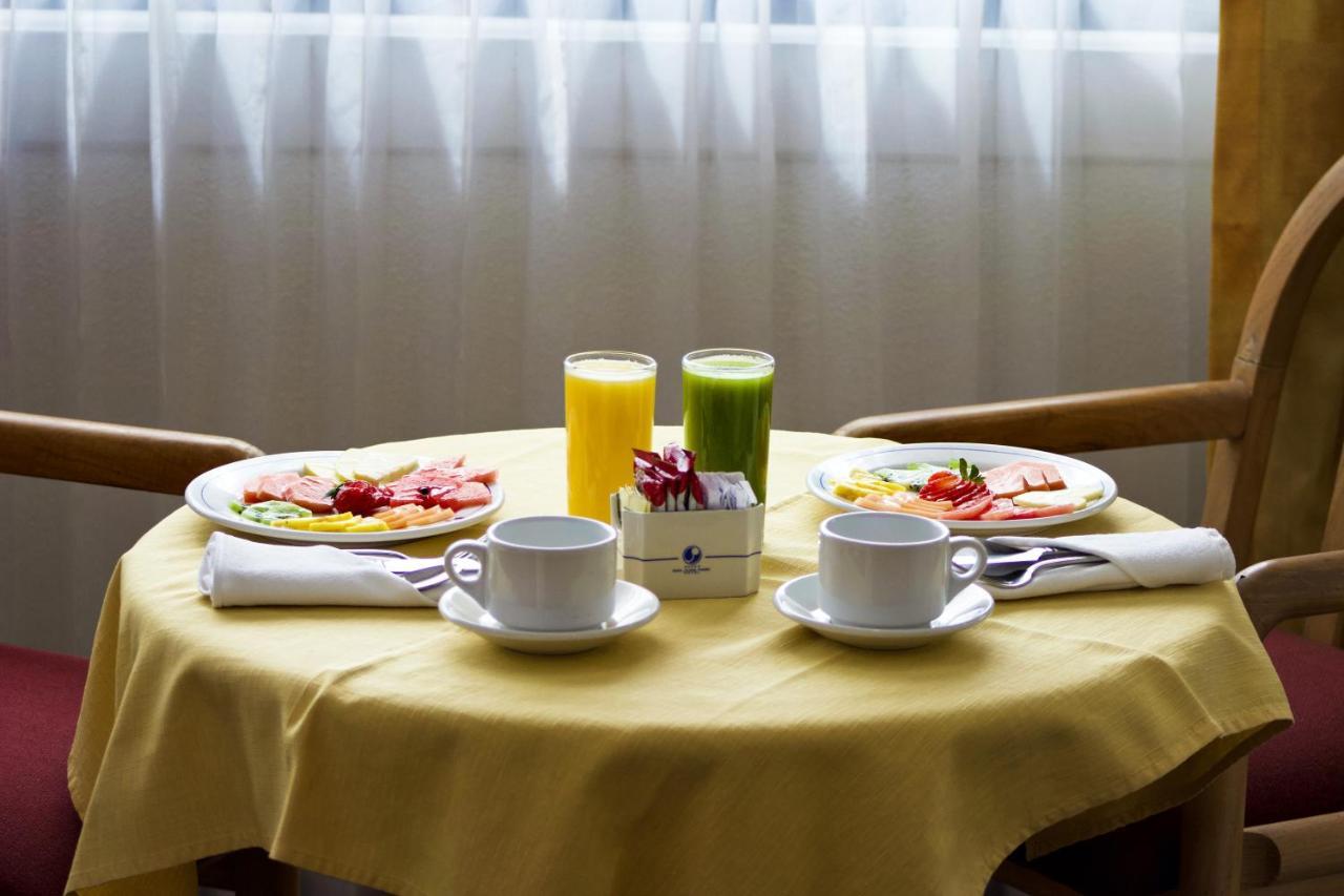 San Juan Park Hotel San Juan del Rio Exterior photo A light breakfast