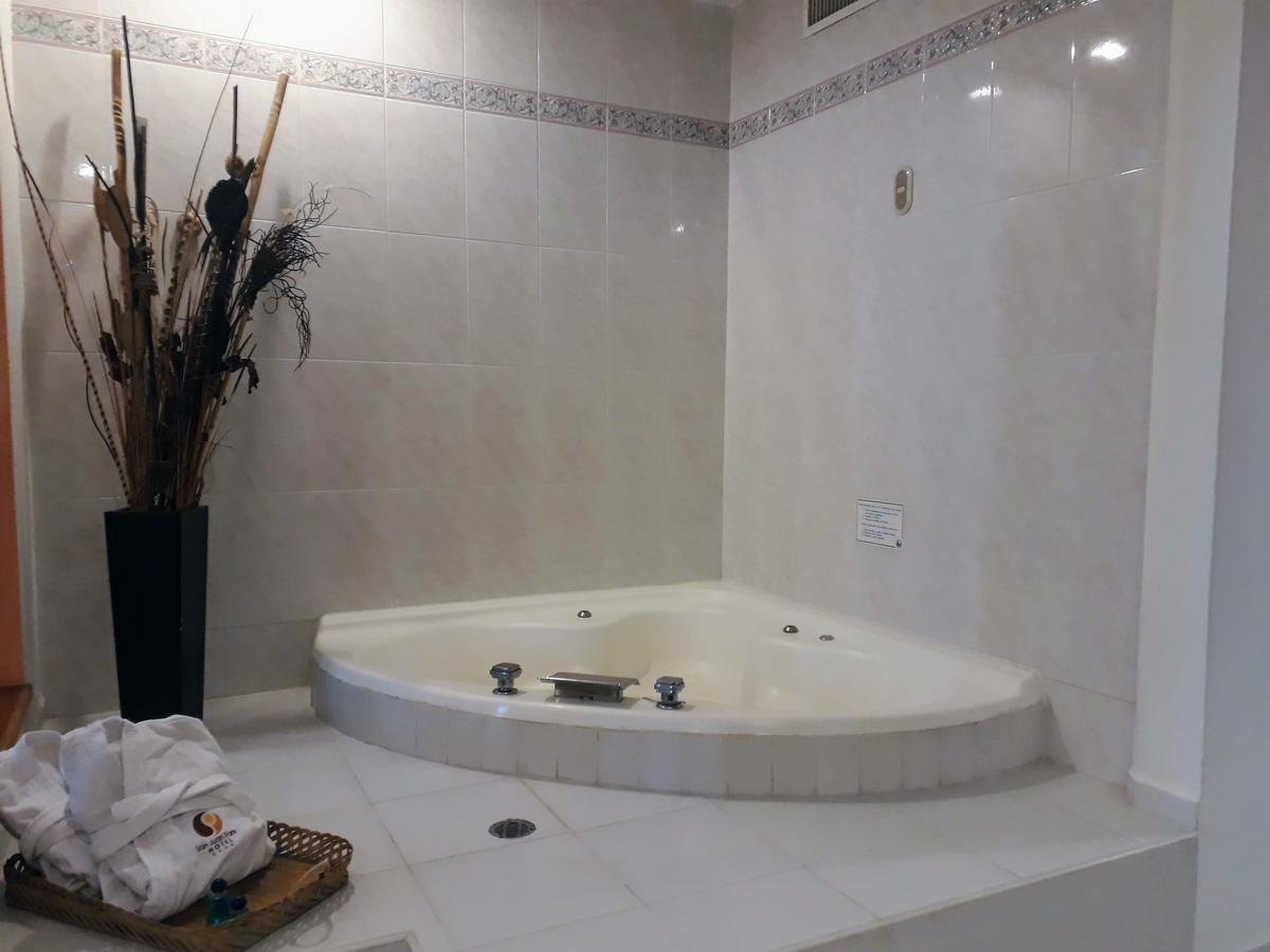 San Juan Park Hotel San Juan del Rio Exterior photo A whirlpool bathtub
